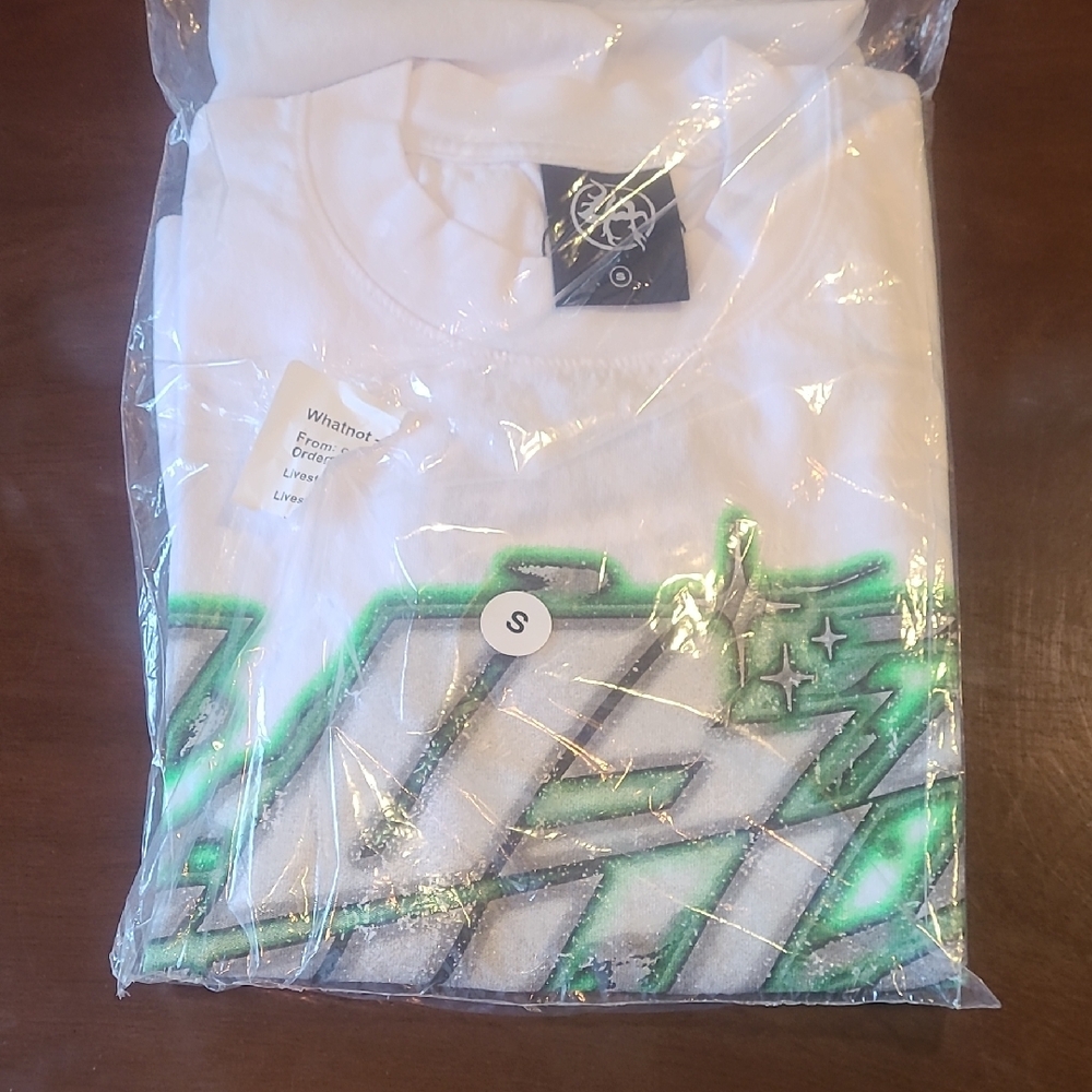 White T-Shirt with Green Graphic